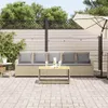 A patio scene with a sofa, coffee table, and umbrella. Náhled obrázku produktu