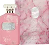A pink perfume bottle and its matching box, both decorated with a marble-like pattern and silver accents. Podgląd zdjęcia produktu