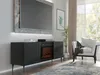 A modern living room with a TV stand featuring a fireplace, a large TV mounted above it, and a comfortable armchair. Podgląd zdjęcia produktu