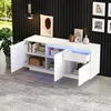A modern white sideboard with LED lighting in a living room setting, featuring decorative items and artwork on the wall. Anteprima dell’immagine prodotto