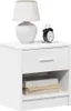 A white nightstand with a drawer and an open shelf, featuring a lamp and an alarm clock on top. Náhľad obrázku produktu