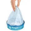 A hand holding a blue and white diaper pail refill bag over a blue and white diaper pail. Náhled obrázku produktu