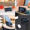 A collage of four images showing different views and uses of a digital projection alarm clock. Produktbild-Vorschau