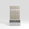 A tall, narrow hall tree with a padded back panel, coat hooks, and two storage cubbies with seats. Náhled obrázku produktu