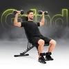 A man is performing dumbbell exercises on an adjustable weight bench. Produktbild-Vorschau