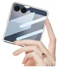 A hand wearing rings is holding a pink phone case with a geometric pattern. Náhled obrázku produktu