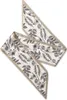 A decorative scarf with a floral pattern, laid out diagonally on a white background. Produktbild-Vorschau