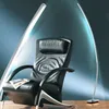 A modern black leather armchair is placed next to two sleek floor lamps, with one lamp casting a bright light upwards. Náhled obrázku produktu