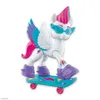 A toy pony figure with wings, wearing sunglasses and riding a skateboard. Náhled obrázku produktu