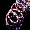 A coiled string of lights with red and white stripes, resembling a candy cane, against a black background. Produktbild-Vorschau
