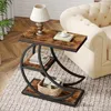 A side table with shelves next to a sofa in a living room. Produktbild-Vorschau