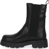 A black leather Chelsea boot with a thick sole is shown against a white background. Anteprima dell’immagine prodotto