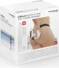 The image shows the product packaging for an anti-cellulite massager. The packaging features a prominent image of the product being used on a person's thigh, along with product name and branding. Voir les images du produit