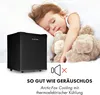 A sleeping child is shown next to a mini-refrigerator, with text indicating it is quiet. Produktbild-Vorschau