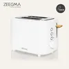 A white Zeegma toaster is shown against a light gray background, with its logo and wattage displayed. Anteprima dell’immagine prodotto