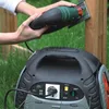 A person is using a jigsaw powered by a portable power station outdoors. Podgląd zdjęcia produktu