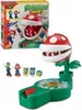 A product shot of the Super Mario Piranha Plant Escape! board game, including the game box and components. Produktbild-Vorschau
