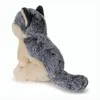 A side view of a plush wolf toy sitting on a white background. Podgląd zdjęcia produktu