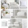 A collage of images showing a white quilted duvet and pillows in various settings and arrangements. Produktbild-Vorschau