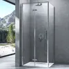 A modern shower cabin with a mountain landscape visible through a large window. Produktbild-Vorschau