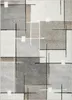 A flat lay image of a rug with an abstract geometric pattern. Produktbild-Vorschau
