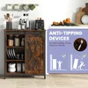 A kitchen sideboard with sliding doors, displaying its storage capacity and featuring an anti-tipping device graphic. Náhľad obrázku produktu