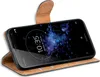 A smartphone in a brown flip case, displayed at an angle. Náhľad obrázku produktu