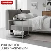 A bedroom scene featuring a bed, a nightstand, and a rug. Anteprima dell’immagine prodotto