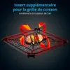 A black grilling insert with food items and red arrows indicating air circulation. Náhľad obrázku produktu