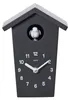 A black cuckoo clock with a white bird and white clock hands and numbers. Produktbild-Vorschau