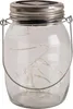A clear glass mason jar with a metal lid and handle, containing a string of fairy lights. The lid has a solar panel integrated into it. Náhľad obrázku produktu