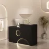 A modern reception desk in a store setting. Produktbild-Vorschau