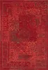 A close-up, top-down view of a red rug with a distressed, vintage-inspired pattern. Produktbild-Vorschau