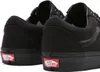 A close-up rear view of two black Vans sneakers. Voir les images du produit