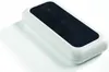 A white remote control with a black panel and buttons, placed on a white surface with a shadow. Anteprima dell’immagine prodotto