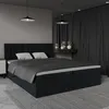 A bedroom scene featuring a bed. Voir les images du produit