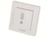A white smart home motion detector mounted on a white wall plate. Produktbild-Vorschau