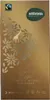 A chocolate bar wrapper with decorative elements and branding. Voir les images du produit