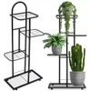 Two black metal plant stands with plants on them, displayed against a white background. Náhled obrázku produktu