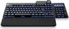 A black mechanical keyboard with blue backlighting and a wrist rest, shown from a slightly elevated front-left angle on a white background. Anteprima dell’immagine prodotto