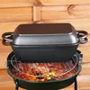 A cast iron pot with a lid sits on a grill over hot coals. Produktbild-Vorschau