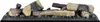 A set of artificial logs for a fireplace, resting on a dark, textured base. Anteprima dell’immagine prodotto