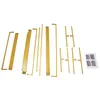 A collection of gold-colored metal rods and connectors, laid out on a white background, likely for assembly. Produktbild-Vorschau