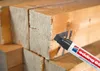 A close-up shot of a marker pen writing on wooden planks. Produktbild-Vorschau