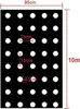 Schwarze Folie mit weißen kreisförmigen Perforationen, mit Maßen von 95 cm Breite, 10 m Länge, 15 cm Abstand und 4,5 cm Lochdurchmesser Anteprima dell’immagine prodotto