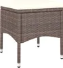 A brown rattan stool with a cream cushion on a white background. Produktbild-Vorschau