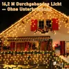 A house decorated with icicle-shaped LED Christmas lights at night. Produktbild-Vorschau