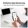A person is holding a smartphone displaying an app, with a tablet and keyboard on a desk. Produktbild-Vorschau