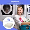 A woman is holding a laundry basket filled with clothes next to washing machines. There is a graphic overlay with product care information. Produktbild-Vorschau
