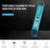 A blue and gray portable magnetic pole identification pen is shown against a dark, textured background. Below the pen are icons representing features like 'Simple operation', 'Small and Light', 'Precision equipment', 'Excellent workmanship', and 'High sens Náhled obrázku produktu